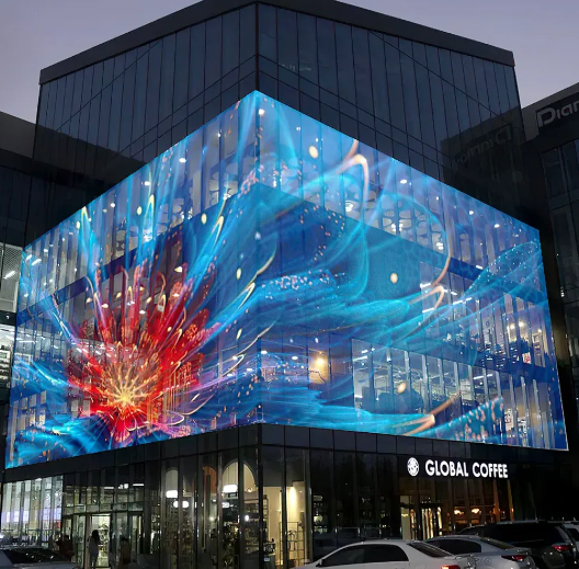Transparent LED display on glass facade with city view