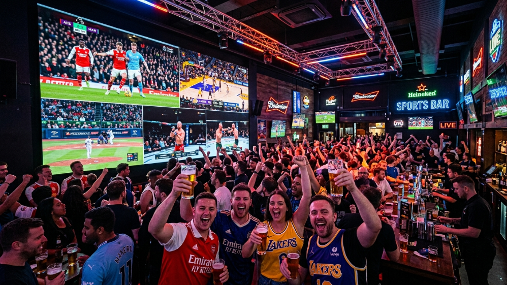Sports bar LED video wall displaying multiple live sports with high refresh rate screens